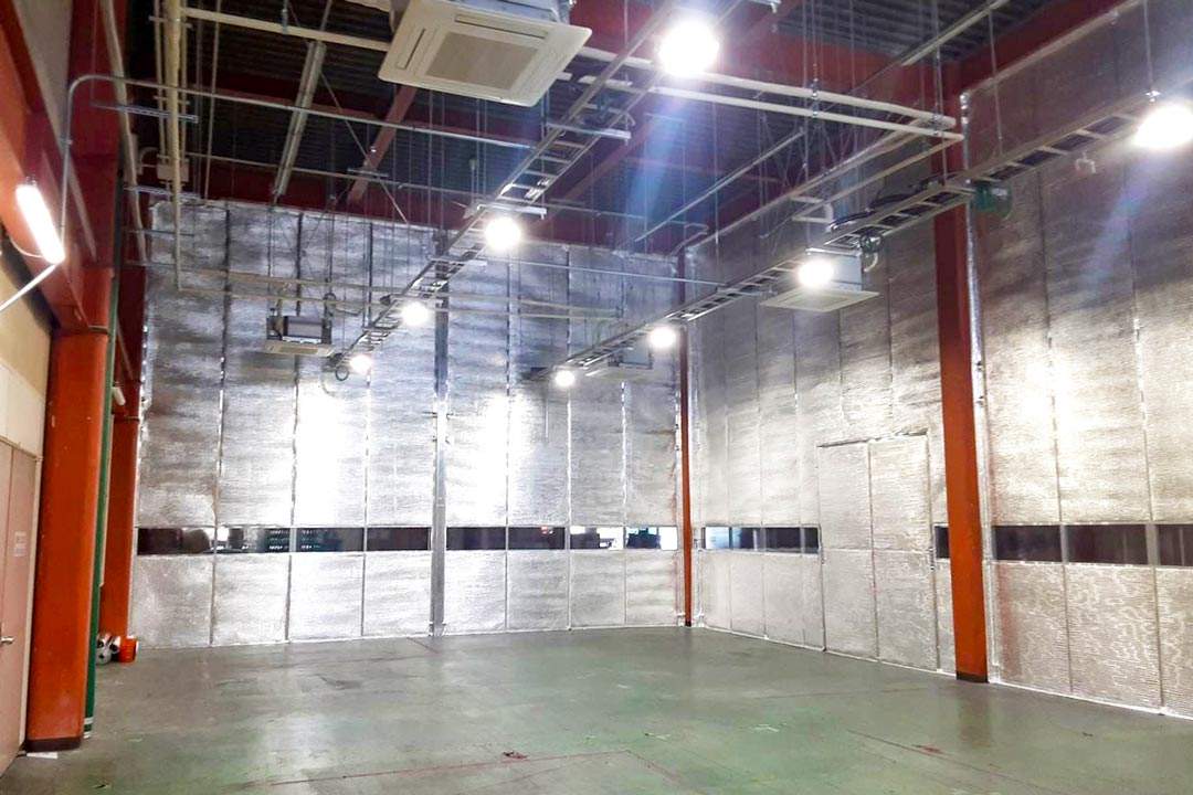 Reflective partition enclosing a production area in Japan