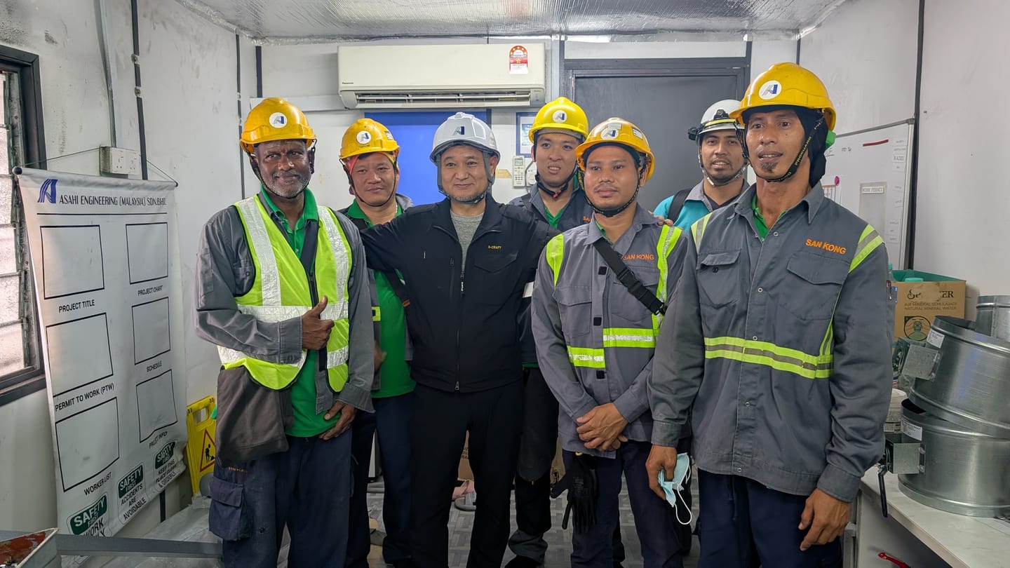 Installation team gathered at the project site